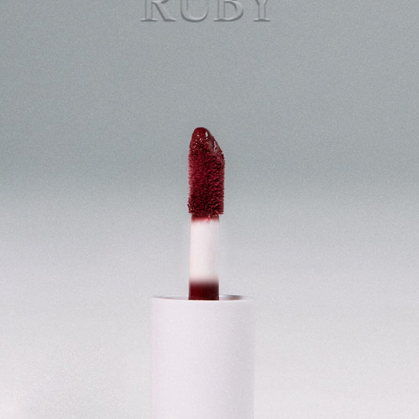 SŚAINT Lip Gloss in Ruby